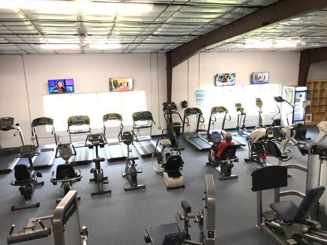 Treadmills and bikes in the cardio area