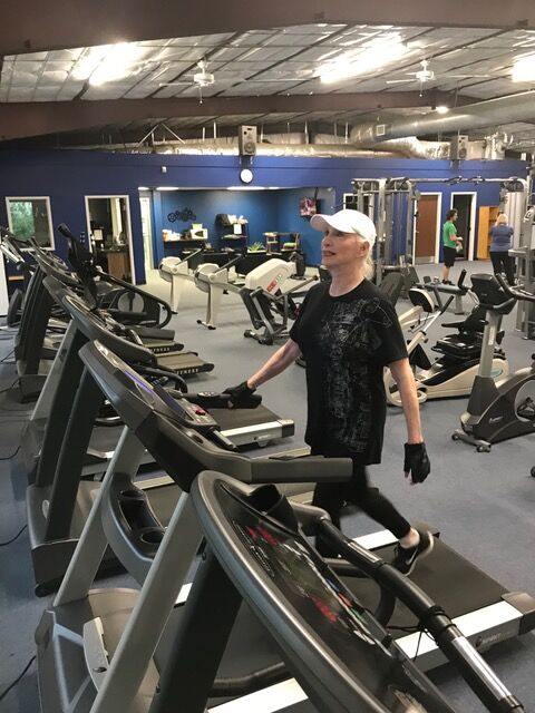 A member on the treadmill row
